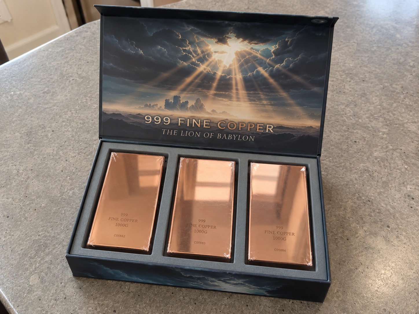 Open collection box with three mirror-polished copper bars
